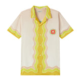 Chemise Aloha tropicale à manches courtes et col camp avec imprimé statue vintage