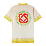 Chemise Aloha tropicale à manches courtes et col camp avec imprimé statue vintage