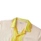 Camisa hawaiana tropical de manga corta con cuello campamento y estampado de estatuas vintage